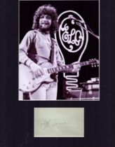 Jeff Lynne Signature piece mounted below black and white photo approximate overall size 16x12 inch