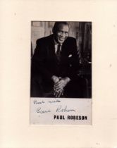 Paul Robeson signed black and white photo mounted to approximate size of 7x5 inch