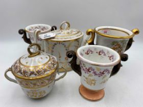 A group of English porcelain, to include a Derby teapot, cover and stand with wishbone handle, circa