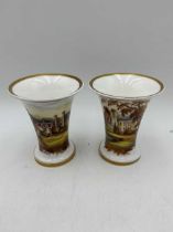 Pair of ceramic spill vases, late 19th century, with flared rims and gilt border, decorated with