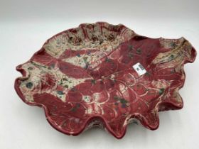 Large studio pottery serving dish in the form of a turbot or fish with scalloped edge, moulded and