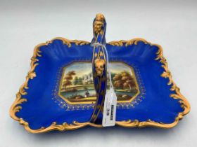 A Minton Clarence basket, design 118, painted with Guy's Cliff, within a blue ground border and
