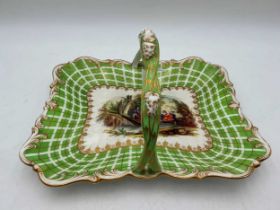 A Minton Clarence basket, painted with a punting scene, within a green basket design border 11 x