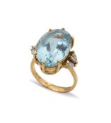 An aquamarine and diamond cocktail style dress ring,