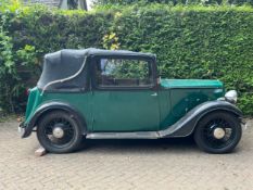 1936 Austin Ten Cabriolet, 1125cc, green with folding black roof, Registration no. CXF 559,