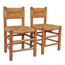 In the Manner of Charlotte Perriand (French 1903-1999) Pair of chairs