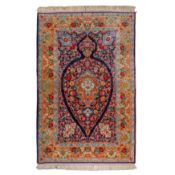 An extremely fine part silk signed Isfahan rug, central Persia