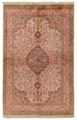 An extremely fine silk Qum carpet, central Persia