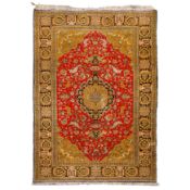 A fine silk Qum rug, central Persia