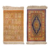 A lot of two very fine silk Hereke rugs, Turkey