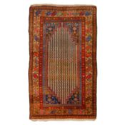 An antique Kurdish rug,
