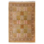 An extremely fine and signed silk Qum rug, central Persia