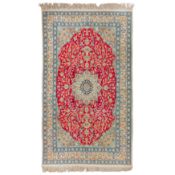 A fine part silk Nain rug, central Persia