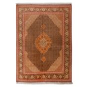 A very fine part silk Tabriz rug, north-west Persia