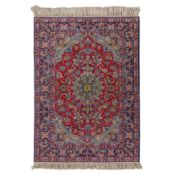 An extremely fine part silk Isfahan rug, central Persia