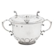 London 1674 by Thomas King (free. 1657, d. 1680) A Charles II sterling silver twin handled porringer