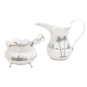 Omara circa 1940 A mid-20th century Iraqi silver milk jug, sugar bowl, and sugar tongs set