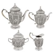 Isfahan circa 1940, marked Farkadyani A mid-20th century Persian (Iranian) silver four-piece tea and