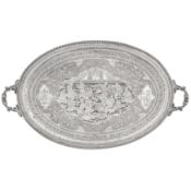 Isfahan circa 1940, marked Farkadyani A mid-20th century Persian (Iranian) silver twin handled tray
