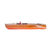 A model of a Chris Craft triple cockpit speedboat