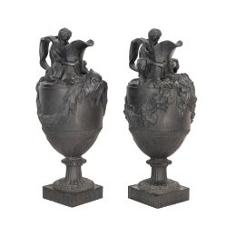 A pair of early 19th Century Wedgwood black basalt ewers circa 1810 designed by John Flaxman