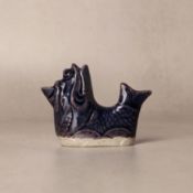 A Chinese biscuit monochrome blue-glazed water dropper, Qing dynasty, Kangxi period 清康熙 素胎藍釉龍魚形水滴 |