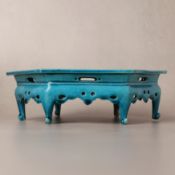 A Chinese turquoise-glazed hexagonal stand, Qing dynasty, Kangxi period 清康熙 孔雀綠釉六方座
