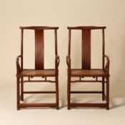 A pair of Chinese huali 'official's hat' yoke-back armchairs, sichutou guanmaoyi, Qing dynasty, 18th