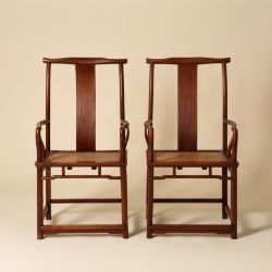 A pair of Chinese huali 'official's hat' yoke-back armchairs, sichutou guanmaoyi, Qing dynasty, 18th