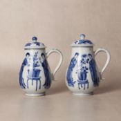 A pair of Chinese blue and white 'ladies' mustard pots and covers, Qing dynasty, Kangxi period 清康熙 青