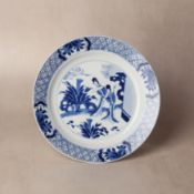 A Chinese blue and white 'ladies' dish, Qing dynasty, Kangxi mark and of the period 清康熙 青花仕女圖盤 《大清康熙