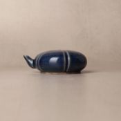 A Chinese monochrome blue-glazed water dropper, Qing dynasty, 18th century 清十八世紀 藍釉水滴 | Santos Colle