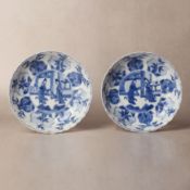 A pair of Chinese blue and white moulded 'ladies' dishes, Qing dynasty, Kangxi period 清康熙 青花模印仕女圖盤一對