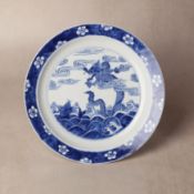 A Chinese blue and white 'dragon and carp' dish, Qing dynasty, Kangxi mark and of the period 清康熙 青花龍