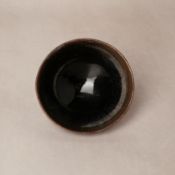 A Chinese Jian black-glazed bowl, Song dynasty 宋 建窰黑釉盌 | Santos Collection