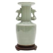 A Chinese Longquan celadon-glazed twin-handled vase, Song - Ming dynasty 宋/明 龍泉窰青釉魚龍耳盤口瓶