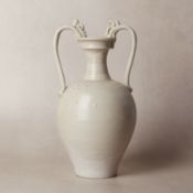 A Chinese straw-glazed stoneware 'amphora' vase, Tang Dynasty 唐 白釉雙螭龍耳瓶