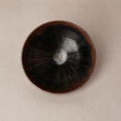 A Chinese Cizhou black-glazed bowl, Song - Jin dynasty 宋至金 磁州窰黑釉盌 | Santos Collection