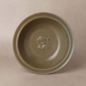 A Chinese Longquan celadon 'twin fish' moulded dish, Ming dynasty 明 龍泉窰青釉貼雙魚折沿盤 | Santos Collection