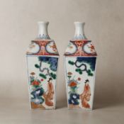 Pair of Japanese Arita Imari 'figural' tokkuri square-form sake bottles, Meiji period, 19th century