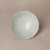 A rare Chinese Qingbai 'floral' foliate cup, Song dynasty 宋 青白釉花卉紋花口盃