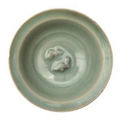 A rare Chinese Longquan celadon 'twin fish' dish, Song / Yuan dynasty 宋或元 龍泉青釉印雙魚折沿盤