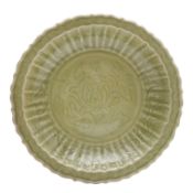 A Chinese Longquan celadon-glazed incised charger, Ming dynasty 明 龍泉窯青釉刻花盤