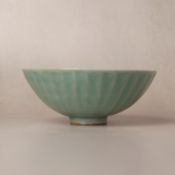 A fine Chinese Longquan celadon 'lotus' bowl, Southern Song dynasty 南宋 龍泉窯青釉蓮瓣紋盌