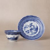 A rare Chinese export soft paste 'landscape' cup and saucer, Qing dynasty, Yongzheng period 清雍正 漿胎青花