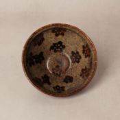A fine Chinese Jizhou 'papercut' 'prunus' bowl, Southern Song dynasty 南宋 吉州窰剪紙貼花梅花紋盌 | Santos Collec