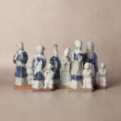 A group of Chinese glazed-biscuit figures, Qing dynasty, Qianlong period 清乾隆 藍釉仙人與童子像 | Santos Colle