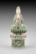 A Chinese enamel on biscuit figure of Guanyin