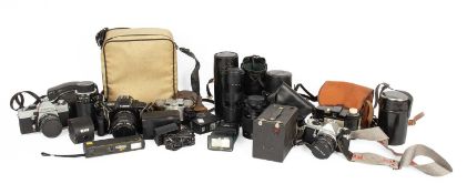 A box of vintage cameras and lenses