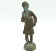 An antique early 20thC. Asian bronze figure of sch